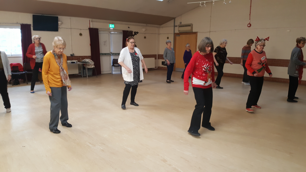 Line dancing in Highwoods Community Centre